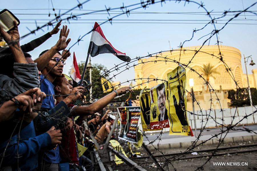 قتيل فى اشتباكات بين أنصار مرسي ومعارضيه شمال القاهرة  (4)