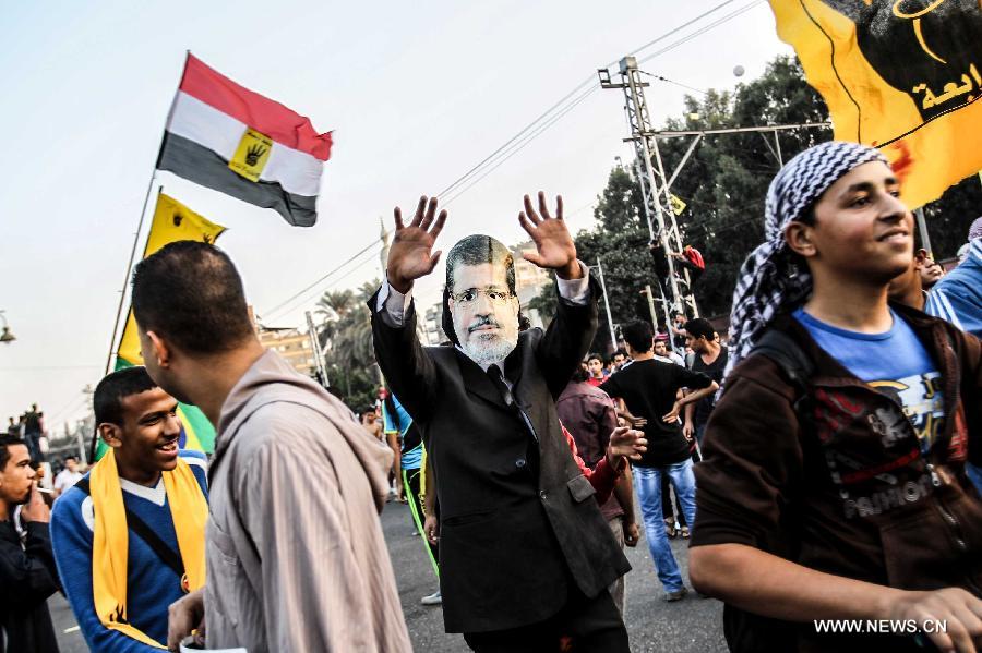 قتيل فى اشتباكات بين أنصار مرسي ومعارضيه شمال القاهرة  (7)