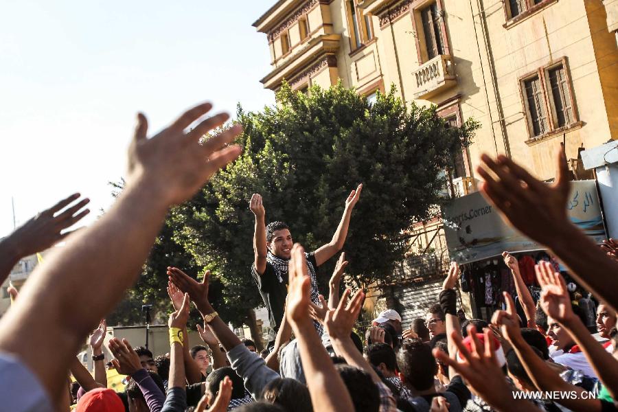قتيل فى اشتباكات بين أنصار مرسي ومعارضيه شمال القاهرة  (3)