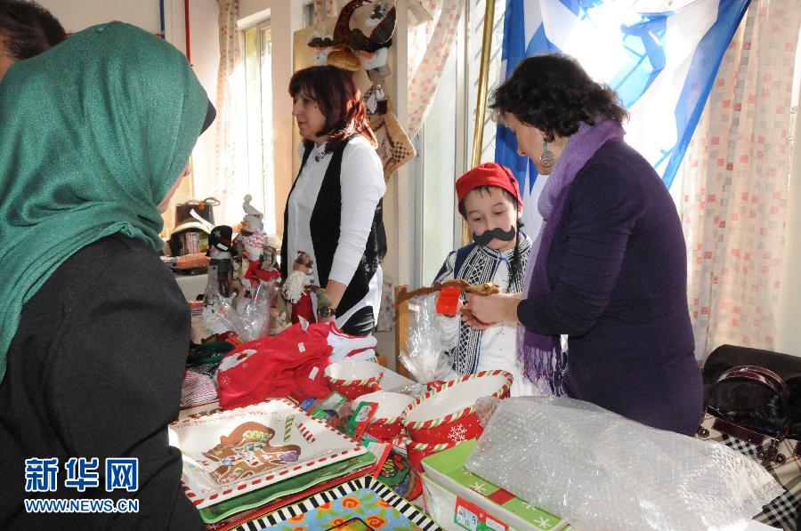 السفارة الصينية بعمان تشارك في سوق خيري بالأردن  (2)