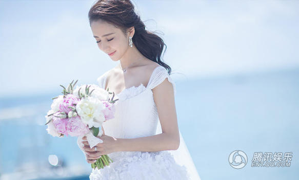 النجمة الصينية الجميلة تونغ لييا في فستان الزفاف  (3)