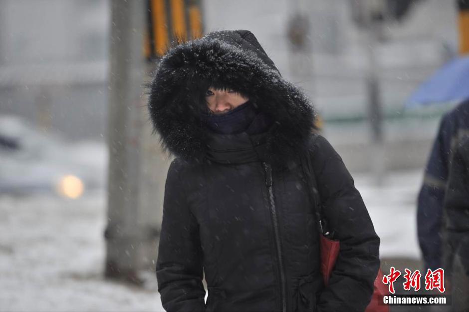 صور: بكين أول يوم تساقط الثلج عام 2014 (5)