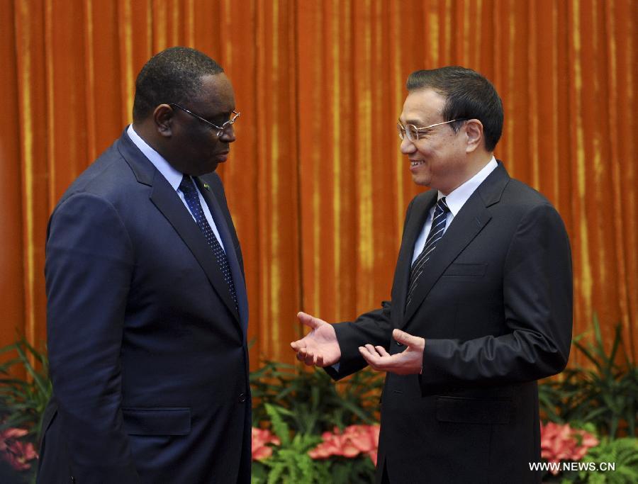 رئيس مجلس الدولة الصيني يلتقي بالرئيس السنغالي