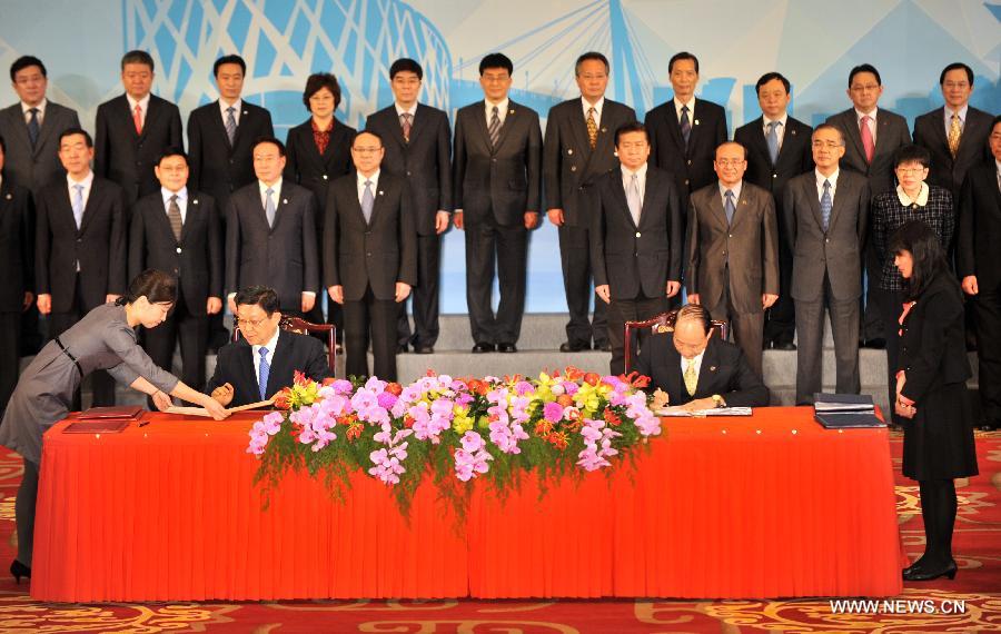 البر الرئيسي وتايوان يوقعان على اتفاقيتين للتعاون  (4)