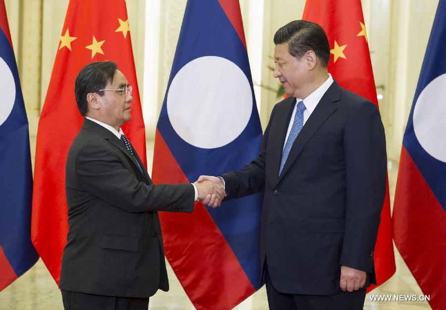 الرئيس الصيني يلتقي برئيس وزراء لاوس ويتعهدان بتعزيز العلاقات
