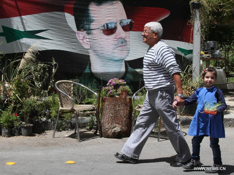 الرئيس السوري بشار الأسد يقدم أوراق ترشحه في الانتخابات الرئاسية