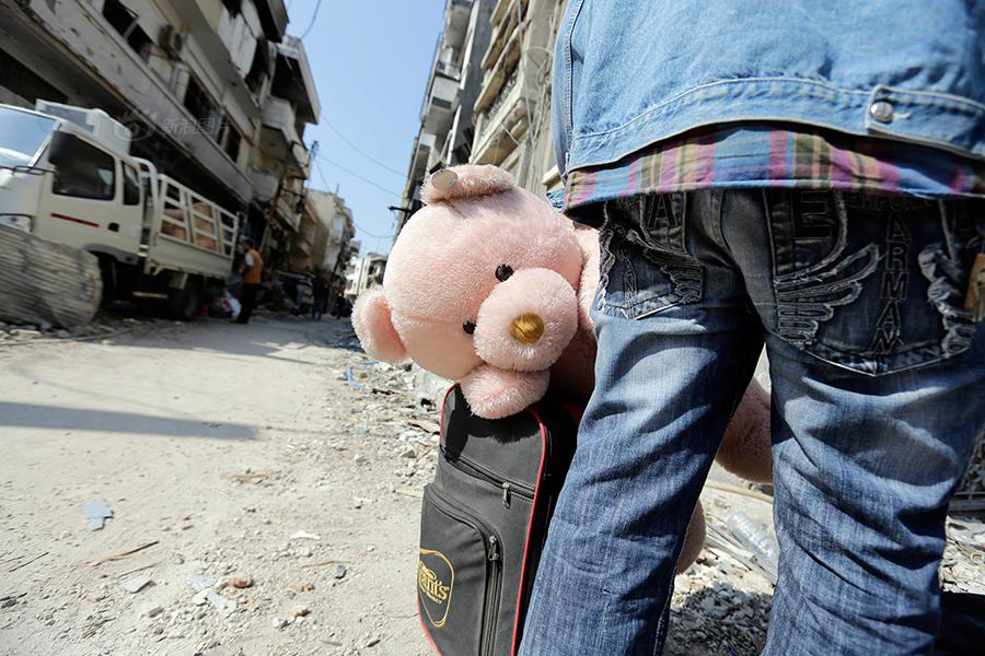 عودة لاجئين سوريين إلى ديارهم في حمص  (4)